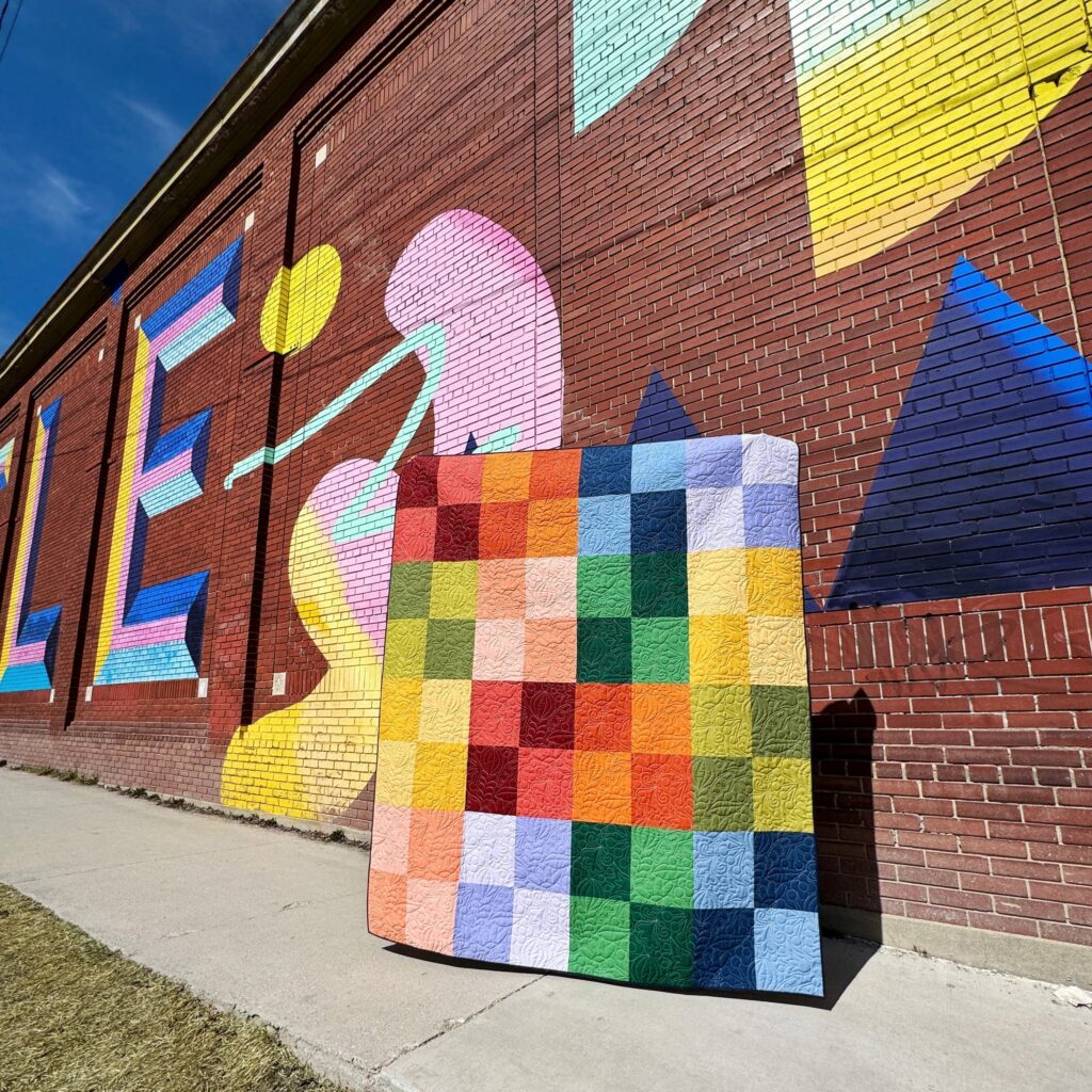 SunnySide-CoverQuilt-BrickWall-Square.jpg