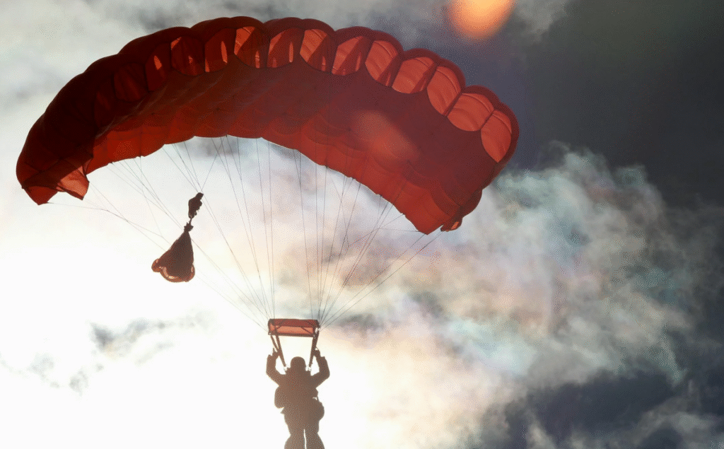 Person_Riding_on_Red_Parachute_80059af9-b461-4c8e-9bab-81024d83bc30_1200x1200.png