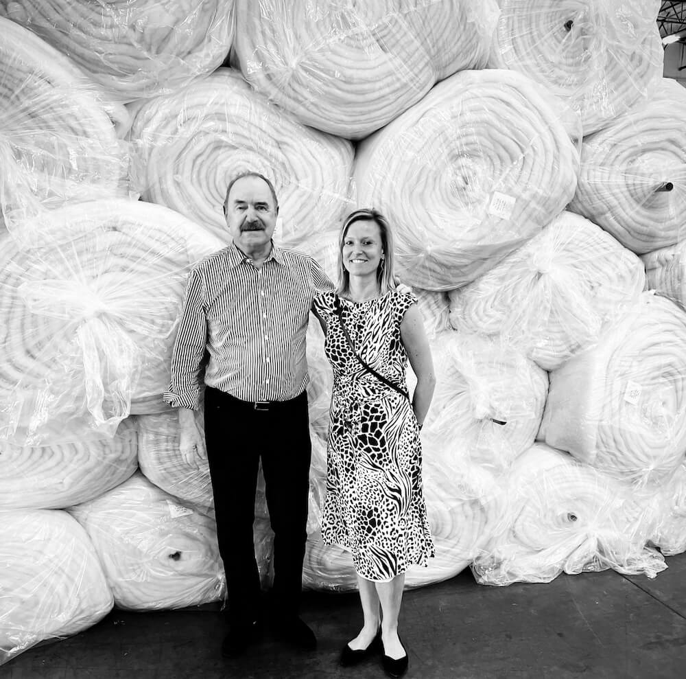 Peter-Crone-Evi-Brilleman-in-front-of-rolls-of-Joma-Wool-Batting.jpg