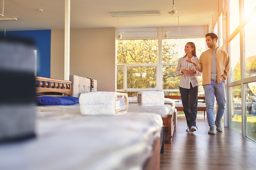 Man-and-Woman-in-mattress-store.png