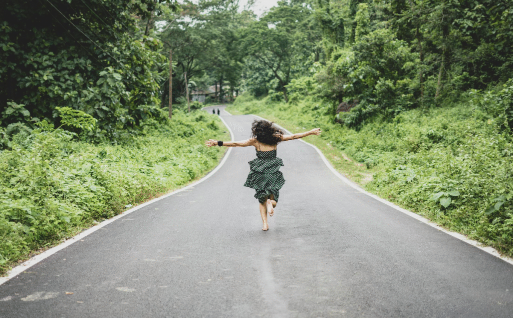 Woman_Running_on_Road_e9a46c46-d02b-46c1-9d56-740177796224_1200x1200.png