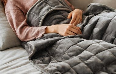 SleepEd_Sleeping_Weighted_Blanket.png